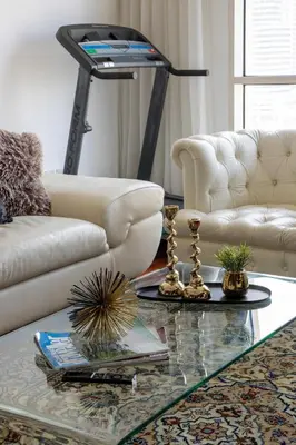 a living room with a couch and a coffee table at Frank Porter - RBC Tower in Dubai