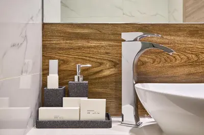 a bathroom with a sink and a faucet at Luxury Studio - SOL BAY Tower - Business Bay by Stayfinity in Dubai