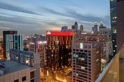 a view of a city skyline at night at Luxury Studio - SOL BAY Tower - Business Bay by Stayfinity in Dubai
