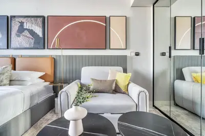 a living room with a couch and a table at GuestReady - Business Bay delight in Dubai