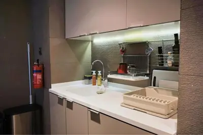 a kitchen with a sink and a counter top at Elegant 2BR in Dubai Marina in Dubai