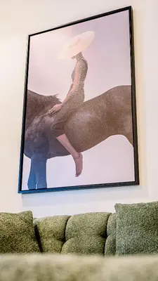 a picture of a woman on a horse on a wall at Fabulous 1BR in Dubai Marina near Beach With Sea Views in Dubai