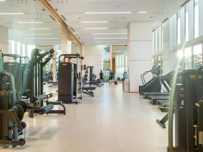 a gym with rows of treadmills and machines at Spacious Dubai Marina 2BR Great Views Top Location in Dubai