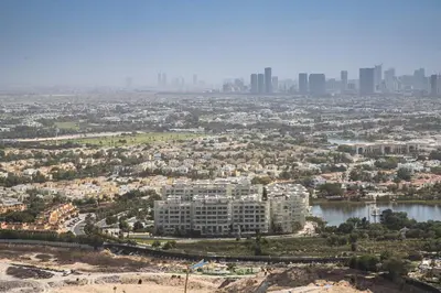 an aerial view of a city with a river and buildings at Frank Porter - MBL Royal in Dubai