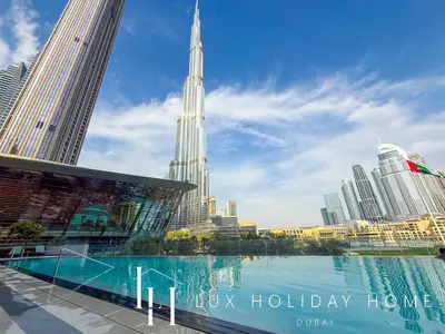 a view of the tsim sha tsui hong kong skyline at LUX The Grande Signature Skyline Suite in Dubai