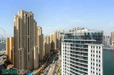 an aerial view of a city with tall buildings at Chic 1Bedroom with Stunning Marina View in Sparkle in Dubai