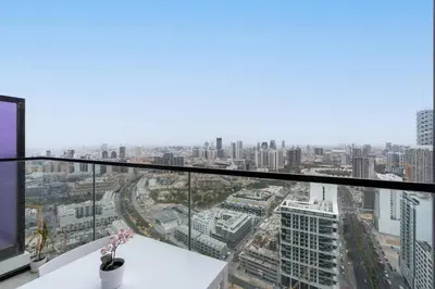 a view of a city from the top of a building at Cozy Studio with Sleek Design in JVC in Dubai