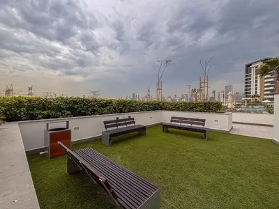 three benches sitting on top of a roof at Frank Porter - Azizi Riviera 1 in Dubai