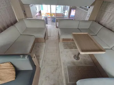 a living room with a couch and a table at Luna Rosa in Dubai