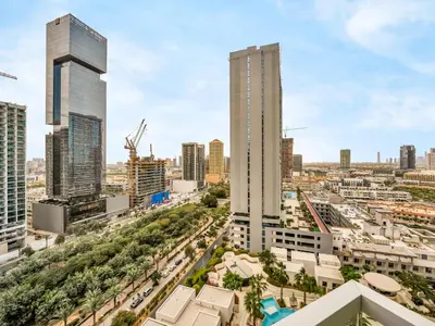 a view of a city skyline with tall buildings at Wonderful Stay At Zaya Hameni - Best Amenities - Unique in JVC - Brand New Luxury Apartments in Dubai