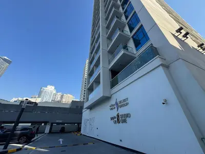 a parking lot in front of a building at STUDIO ONE Stunning Marina View - TIE in Dubai