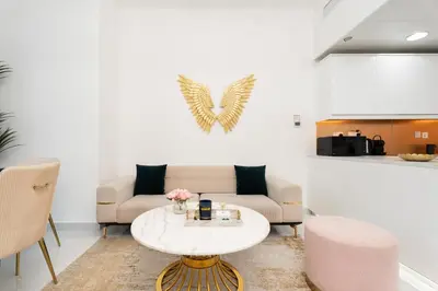 a living room with a couch and a table at GuestReady - Fabulous home with Marina Canal views in Dubai