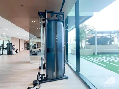 a gym with exercise equipment in a building at Luxury & Comfort at Binghatti Amber with Balcony in Dubai