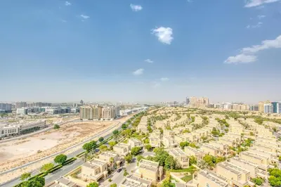 an aerial view of a city with buildings at Serene 2 Bedrooms Apartment in Dubai