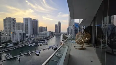 a view of a river with boats in a city at Stella Maris Marine view in Dubai