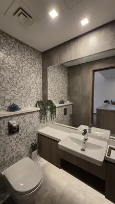 a bathroom with a sink and a toilet and a tub at Stella Maris Marine view in Dubai