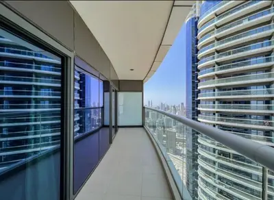 a balcony in a building with a view of a city at Luxury 2 Bedroom Apartment in Downtown in Dubai