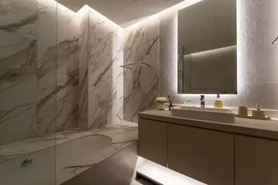 a bathroom with a sink and a tub and a mirror at Gracious 1BR in Condor Marina Star, Dubai Marina in Dubai