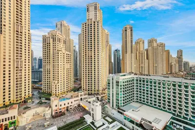 an aerial view of a city with tall buildings at Relaxing 1BR in Dubai With Access to Pool, Gym & Parking in Dubai