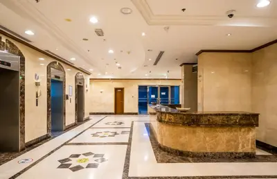 a lobby with a bar in a building at Lavish 1 bedroom in Dubai