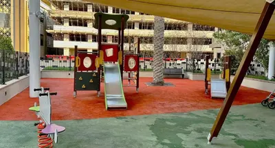 a playground with a slide in a building at South Ridge 1, Downtown Dubai - Mint Stay in Dubai