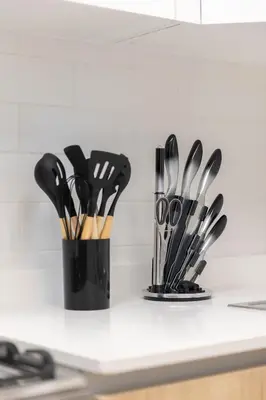 a counter with a bunch of kitchen utensils at Premium Apartment, Right Infront of Canal in Dubai