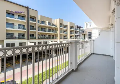 an empty balcony of a apartment building at Dream Inn - Modern 1BR in Arjan in Dubai