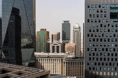 a view of a city with tall buildings at Stylish 2Bedroom in DIFC Dubai Newly Furnished in Dubai