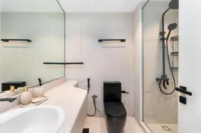 a bathroom with a sink and a shower at Renovated Studios in Nature at Discovery Gardens in Dubai