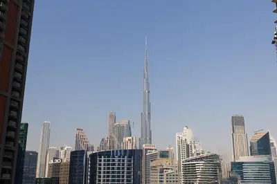 a view of a city skyline with skyscrapers at Stunning Studio in Peninsula Five in Dubai