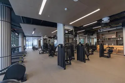 a gym with rows of chairs in a room at Stunning Studio in Peninsula Five in Dubai