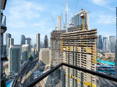 a view of a tall building under construction at Stylish 3BR in BurjCrown Balcony & HighEnd Comfort in Dubai