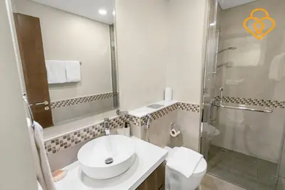 a bathroom with a sink and a toilet and a shower at Keysplease 1 BR Apt, Vera Residence Business Bay in Dubai
