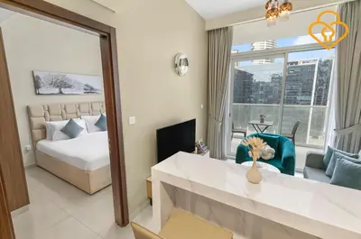 a bedroom with a bed and a large window at Keysplease 1 BR Apt, Vera Residence Business Bay in Dubai