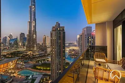 a view of a city from the balcony of a building at Luxurious 4BR In Act 1 Act 2 With Burj Khalifa View in Dubai