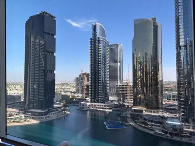 a view of a city with a river and buildings at ZenStay-Stylish Studio 1 Min to Metro in JLT in Dubai