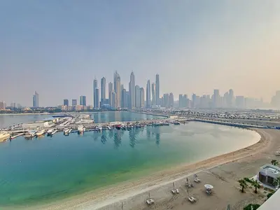 a view of a city with a beach and buildings at Marina Vista - Airy One Bedroom in Dubai Marina in Dubai