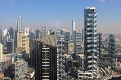 a view of a city with tall buildings at Livbnb- Coastal 2B with Marina View Walk to Beach in Dubai