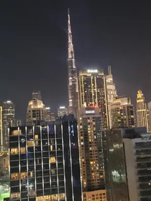 a view of a city skyline at night at Luxurious 2bhk apartment in Business Bay in Dubai