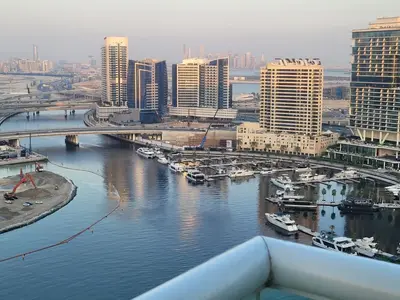 a view of a river in a city with buildings at Luxurious 2bhk apartment in Business Bay in Dubai