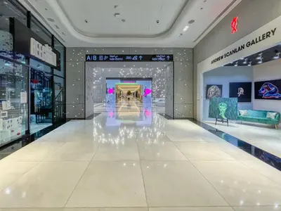 a fashion store with a large white floor at Luxury 2BR Stay in DIFC, Steps to Gate Avenue and Dubai Mall in Dubai