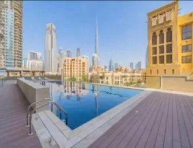 a large swimming pool on a rooftop of a building at Hideaway in Downtown in Dubai