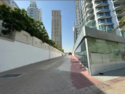 a street in a city with tall buildings at Luxurious Home in the heart of Dubai Marina in Dubai