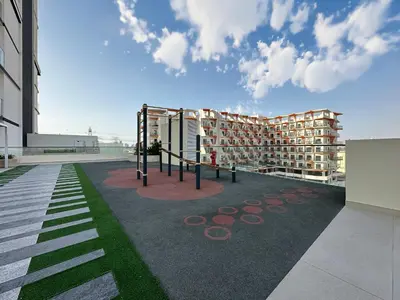 a view of a building from the courtyard of a building at Trophy-Cultivate Retreat with Statement Design in Dubai