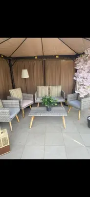 a group of chairs and a table in a tent at Azizi riviera in Dubai