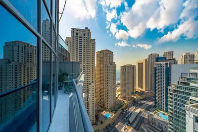 a view of a city skyline from a building at Stunning Views Spacious 3BR Dubai Marina in Dubai