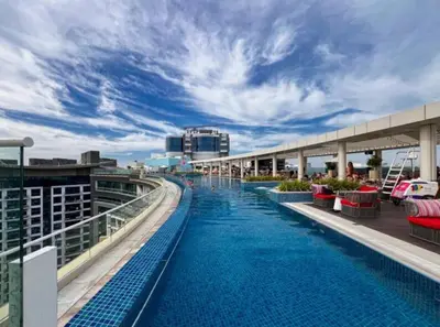 a swimming pool on the top of a cruise ship at 1BR Apartment on The Palm Walk to Beach Mall Pool Restaurants in Dubai