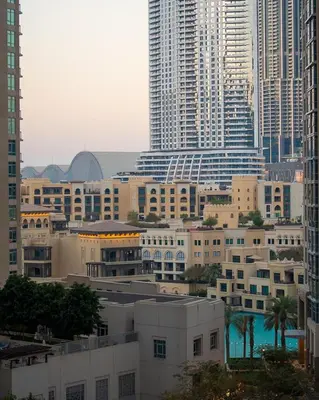 a view of a city with tall buildings at Boulevard Central Towers Downtown Dubai - By Home Of Choice in Dubai