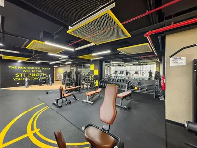 a gym with chairs and equipment in a building at Stylish Dubai Downtown Studio by Burj Khalifa in Dubai