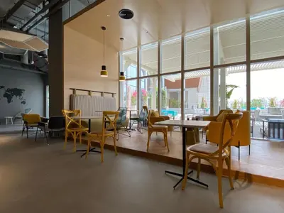 a dining room with a table and chairs at Private Apartment in Novotel JVT Comfort for 4 Guests in Dubai